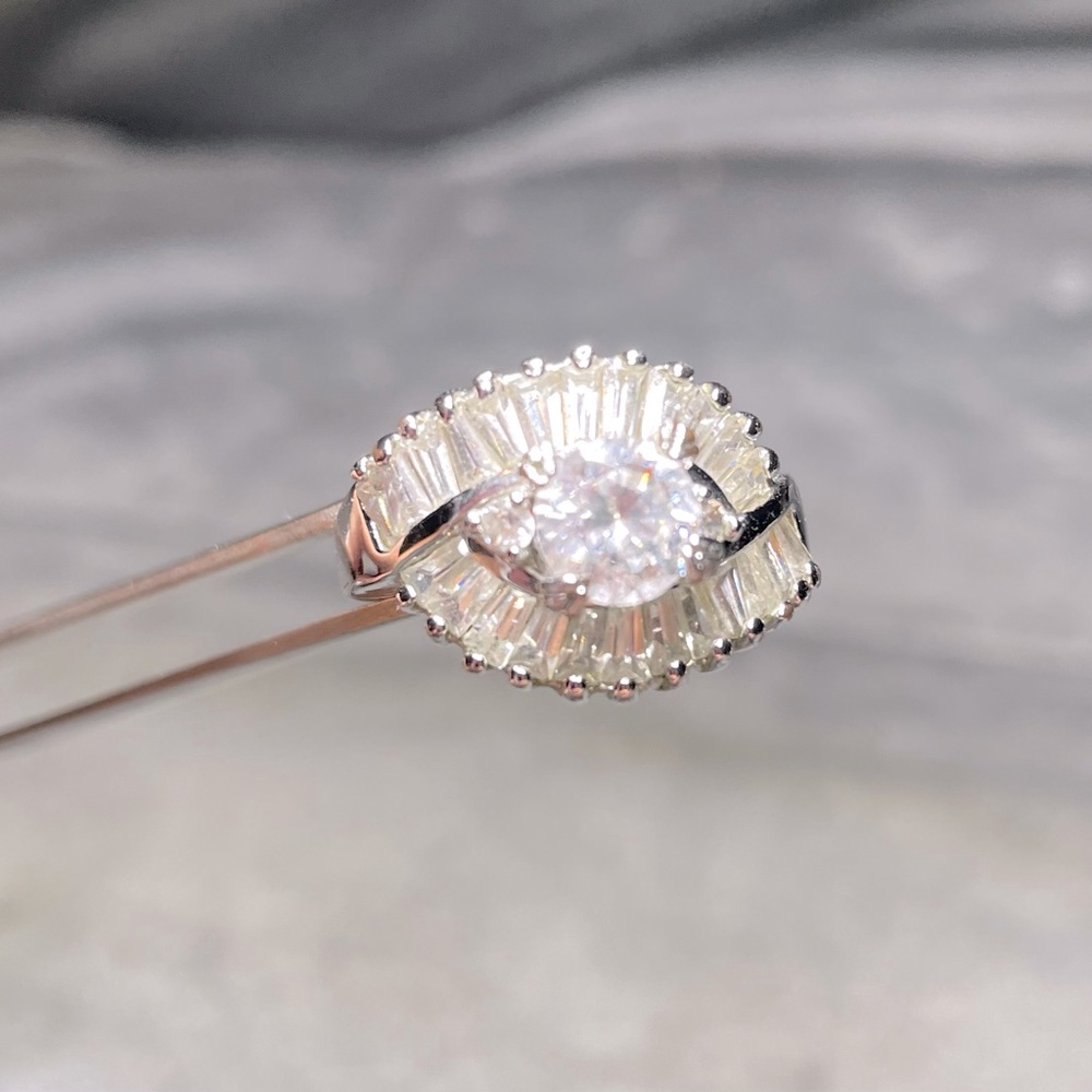18 karat plated Domonique ring Large center stone surrounded by baguettes